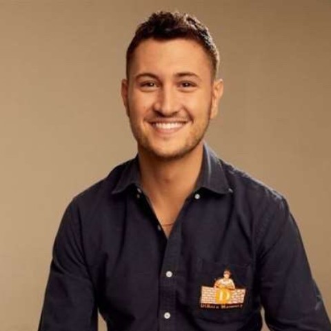 Matt DiBara, Owner of DiBara Masonry seen posing for a photo with a bright smile on his face